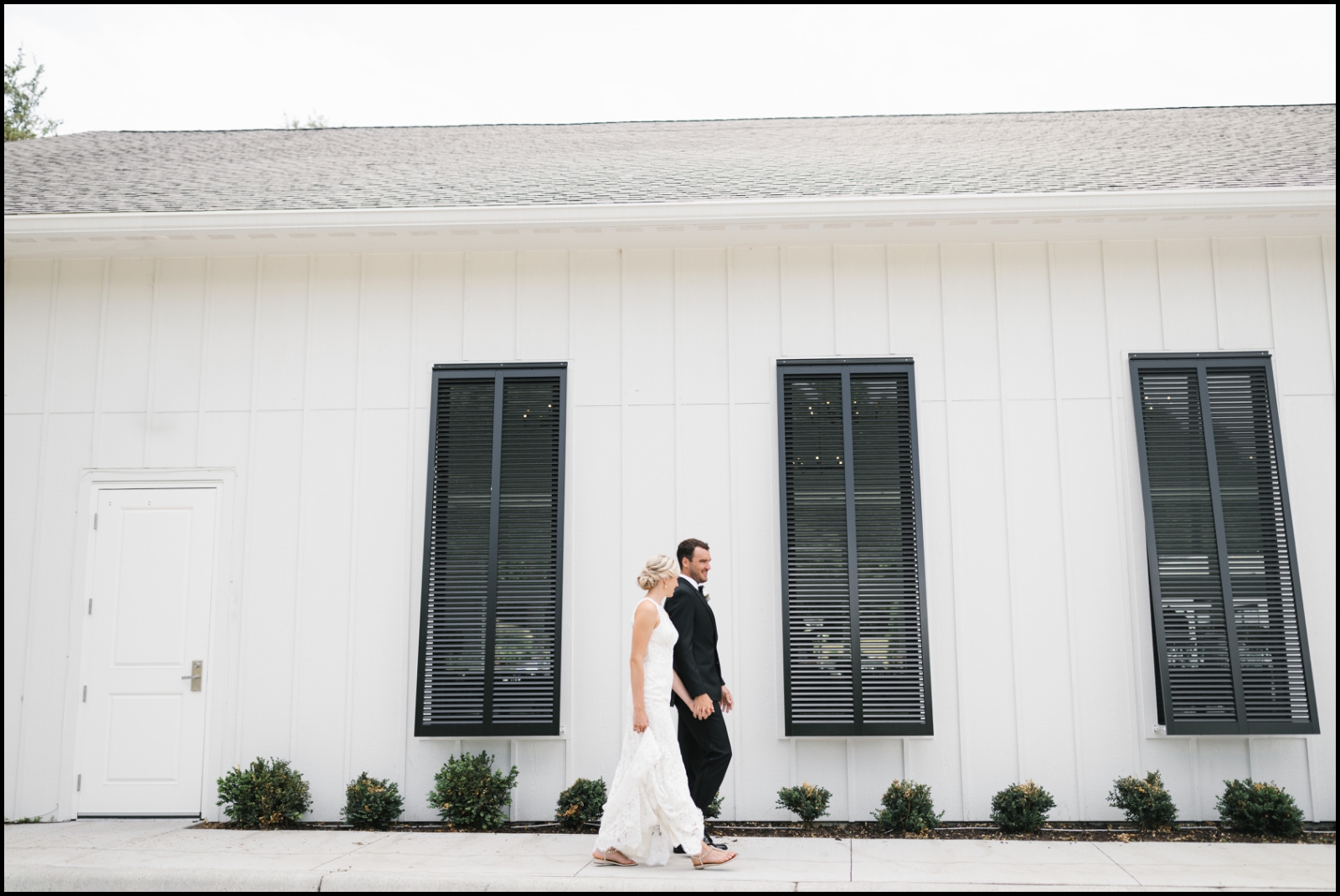 bride and groom walking in Hutton House
