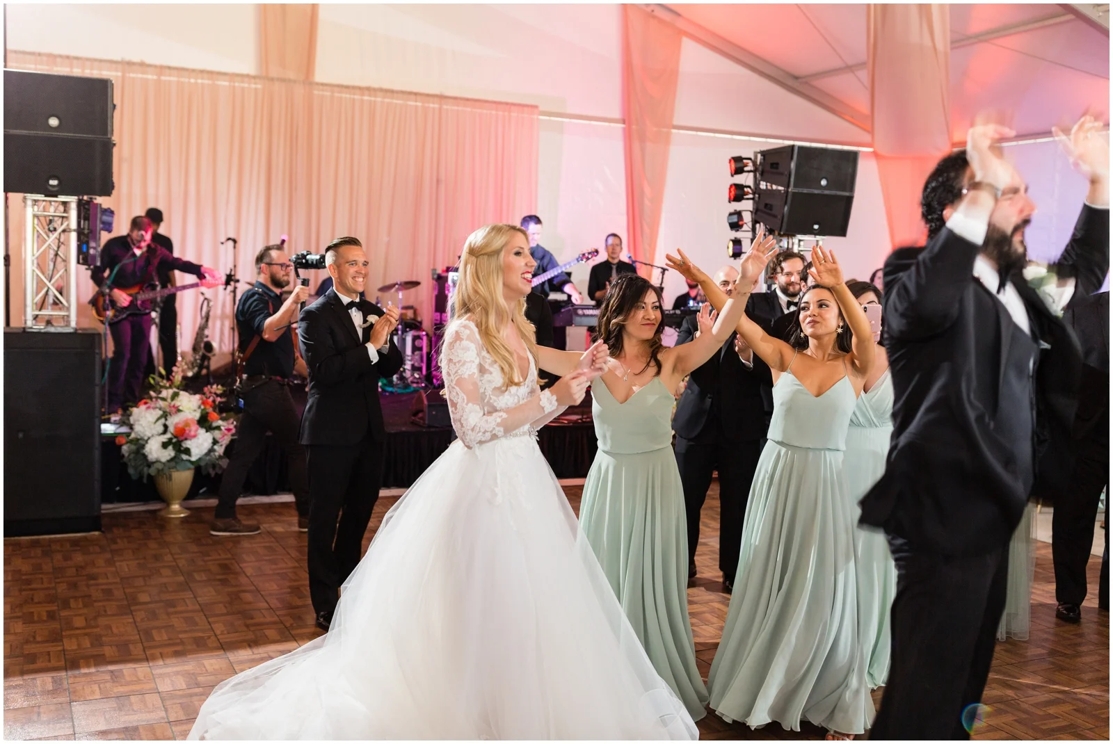 bride and bridesmaids dancing