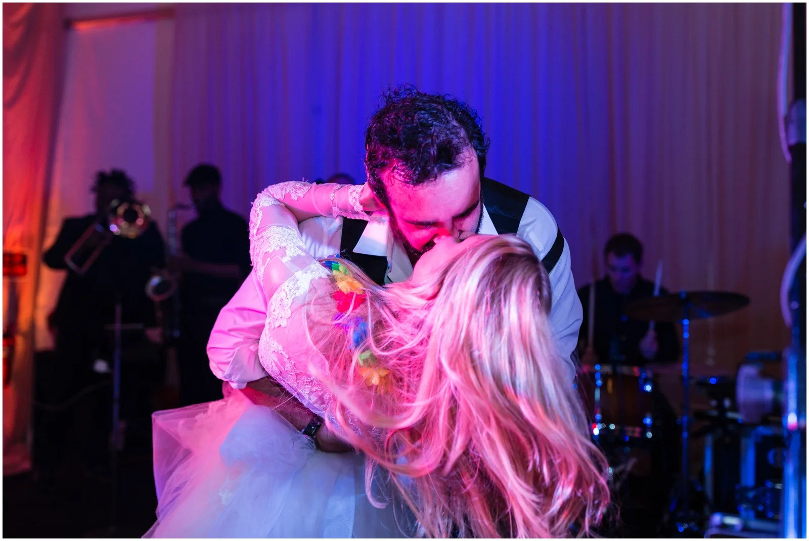 bride and groom kiss