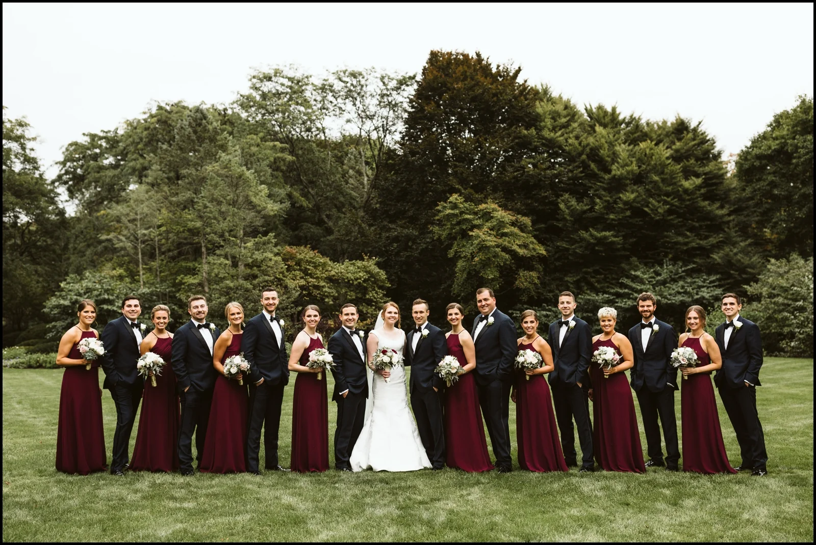 Bridal party with the bride and groom