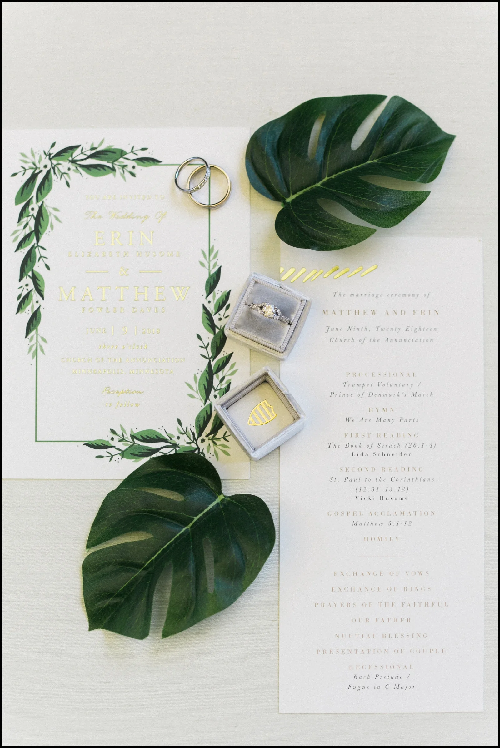 wedding invitation and wedding ring