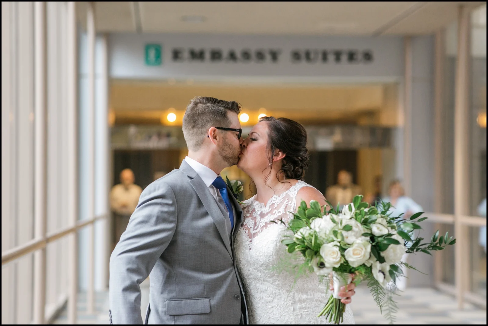 bride and groom’s kiss before their wedding in MPLS