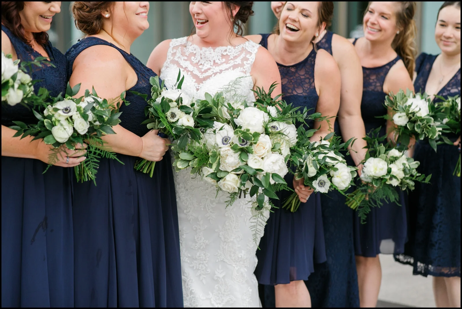 Bridesmaids holding their wedding bouquets