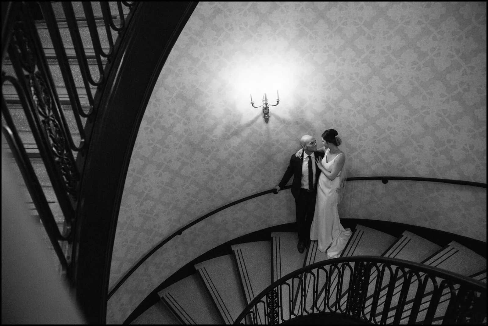 Bride and groom in stairwell