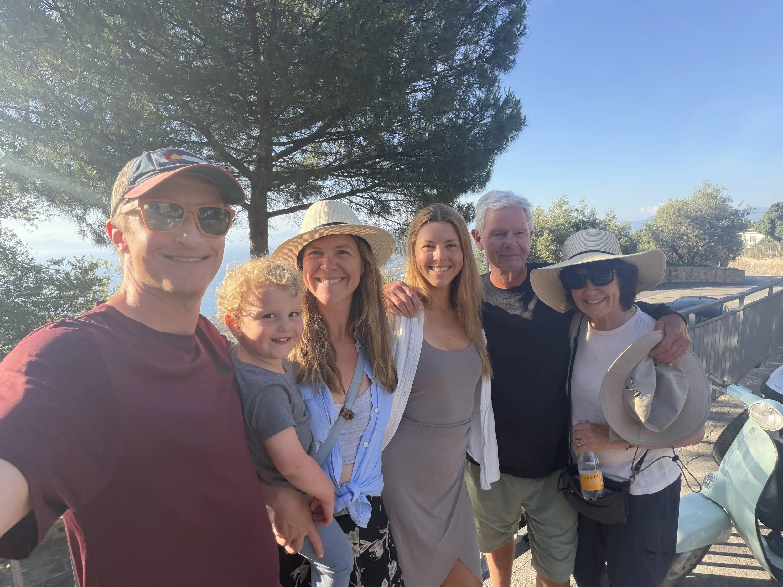 Dr. Alison Hearst with family and friends during an outdoor gathering.