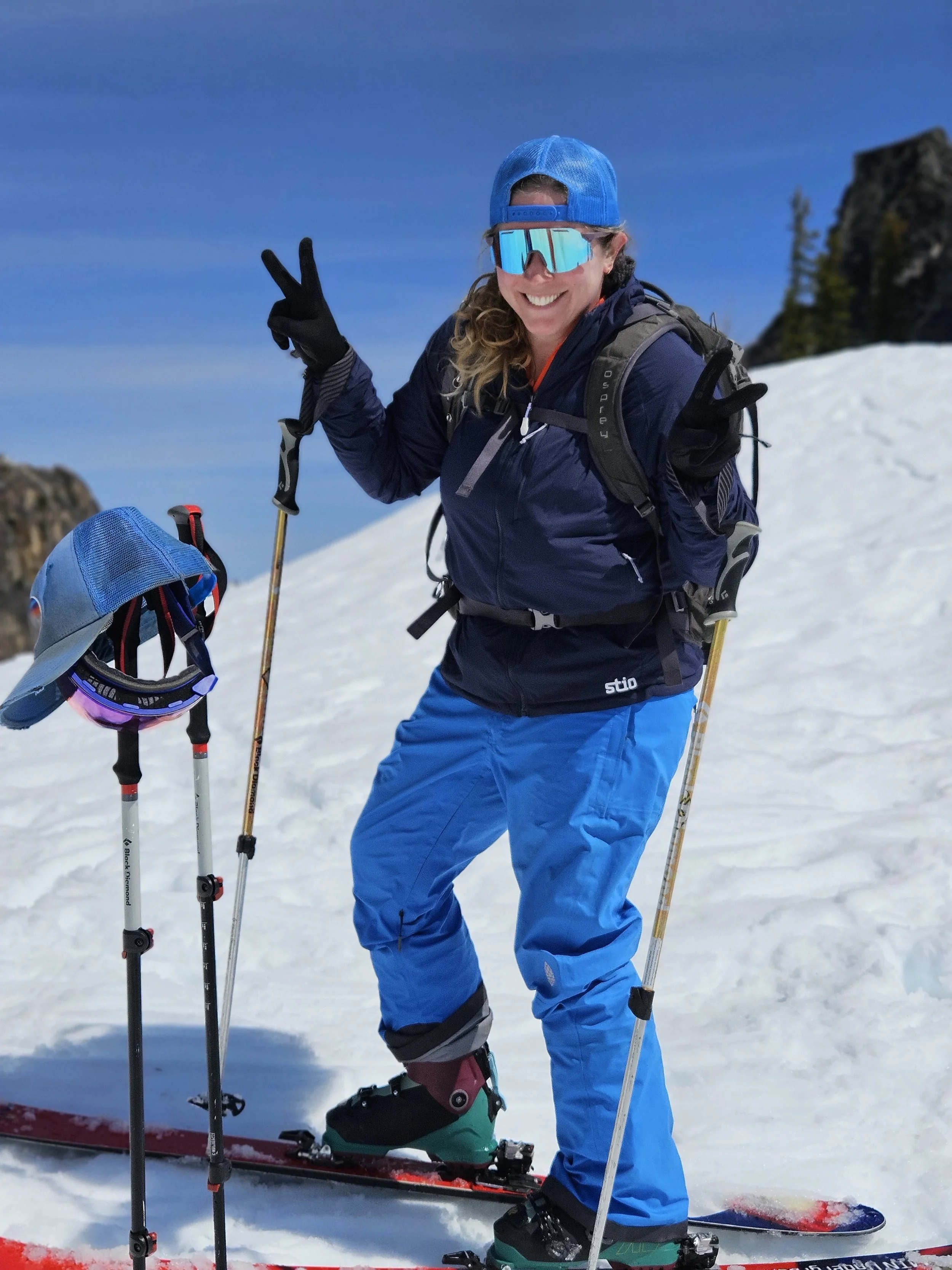 Dr. Lea McKinstry skiing in the mountains.