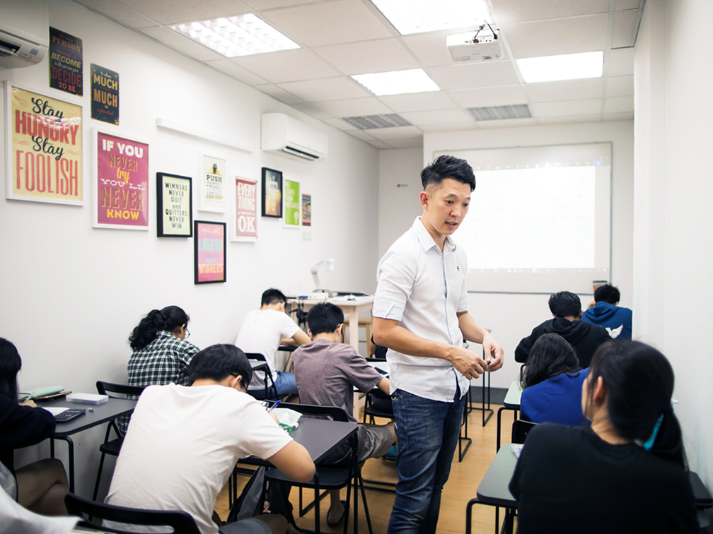 With more than a decade of teaching experience in MOE schools, Calvin Kong had worked with a wide spectrum of students, ranging from those gifted in Physics to the ones who find the subject very challenging. These very important experiences had helped him develop an acute sense in picking the right words to explain concepts to the right students. In class, he memorises all the questions and answers that he provides his students for practice. Together with his years of experiences and familiarity with common difficulties faced by students, he is able to spot on students' difficulties and give quick and succinct feedback to help them move on. Every class is highly efficient.