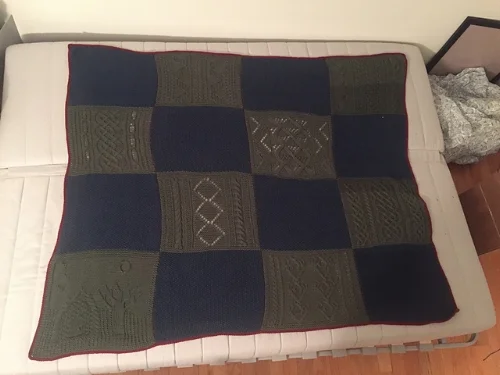 December 20, 2016. The afghan is seamed, edged, blocked, and all the ends are woven in. 8 years after casting on, the afghan is done. It is 4 squares by 4 squares.
