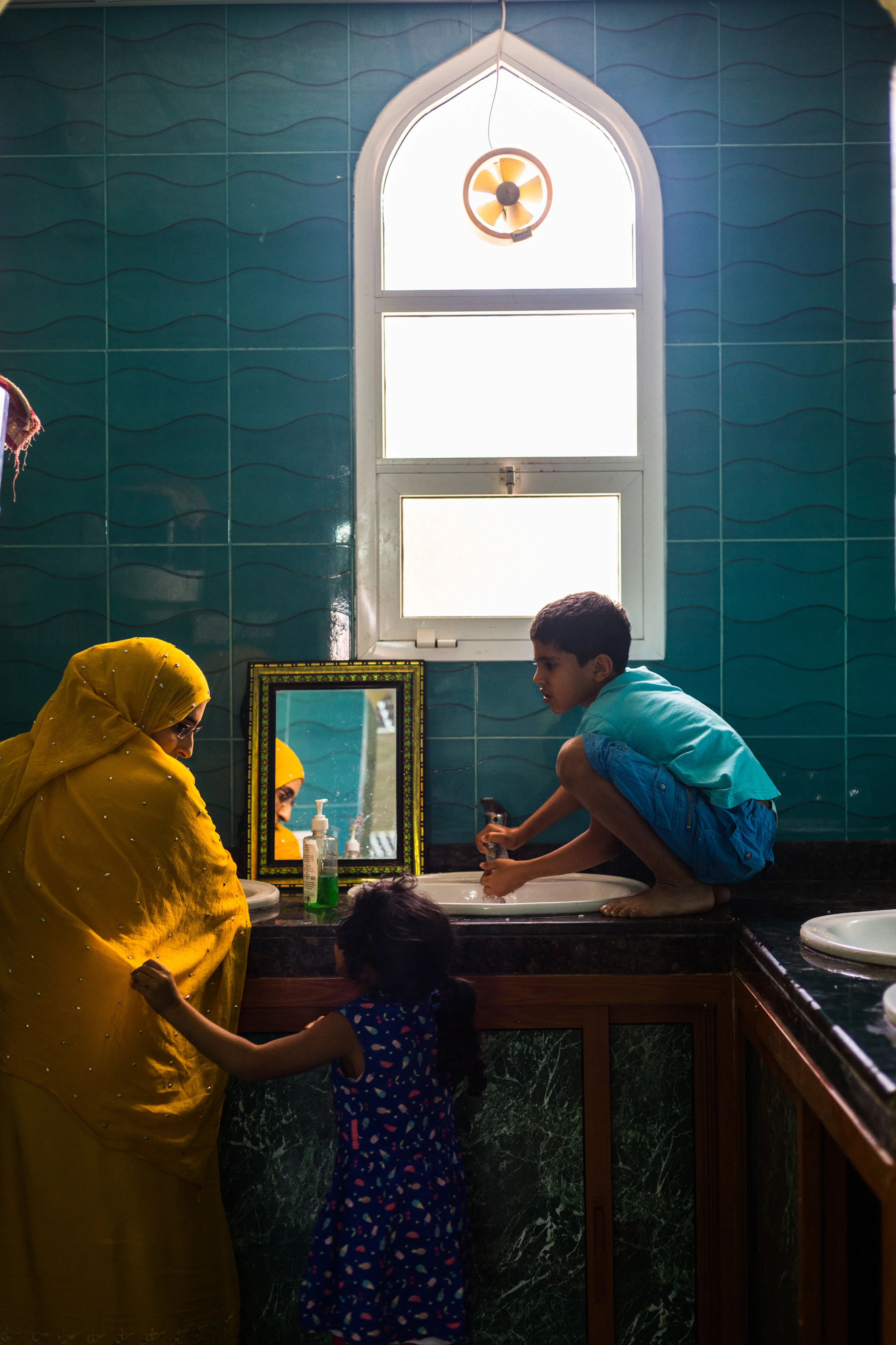  Washing up before lunch in Al Rustaq. 