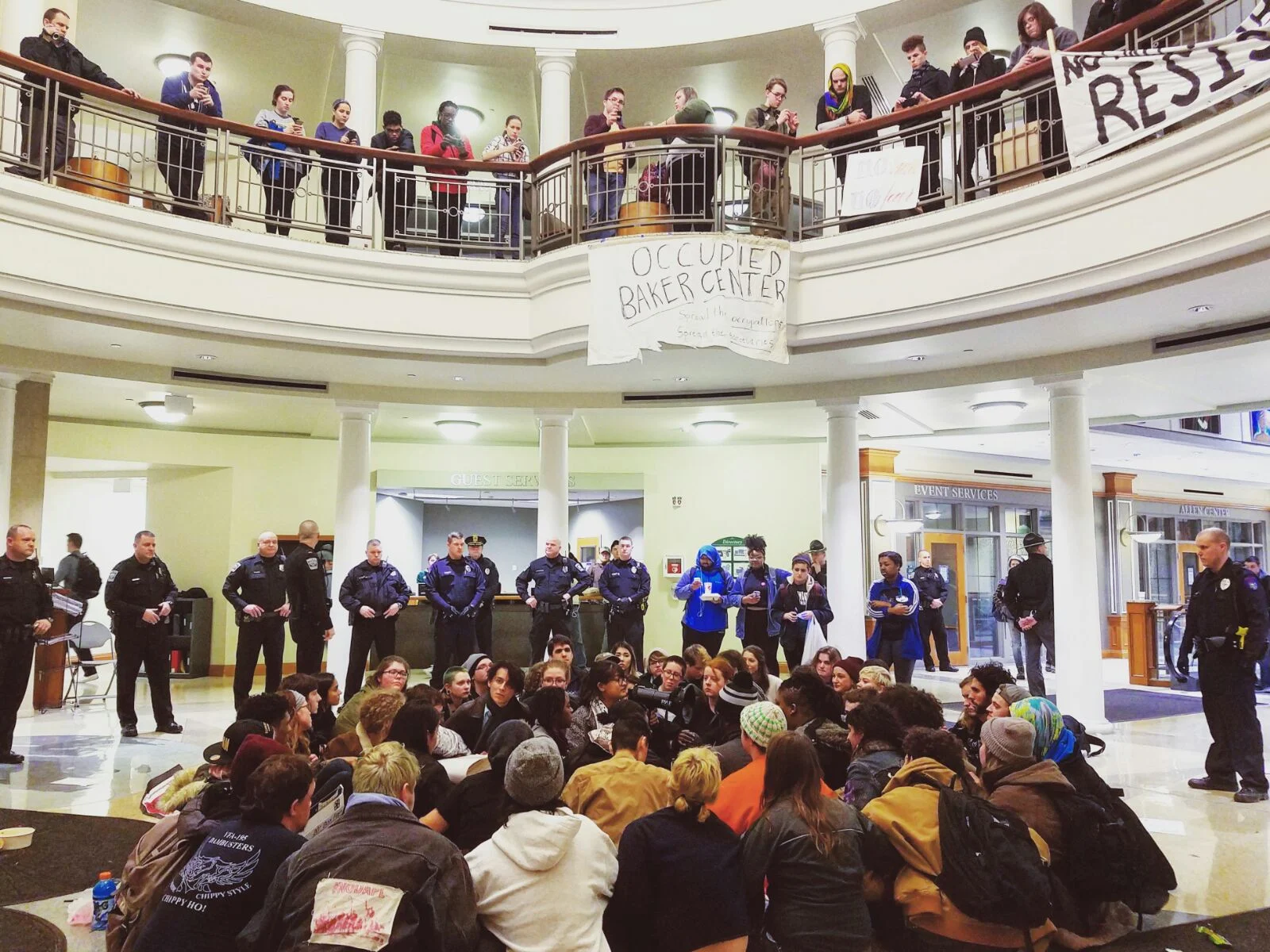  Protesters sit-in at Ohio University's Baker Student Center on Feb.&nbsp;1, 2017, to petition the administration to become a sanctuary campus and respond more strongly to President Trump's travel ban. Around 70 students and community members were ar