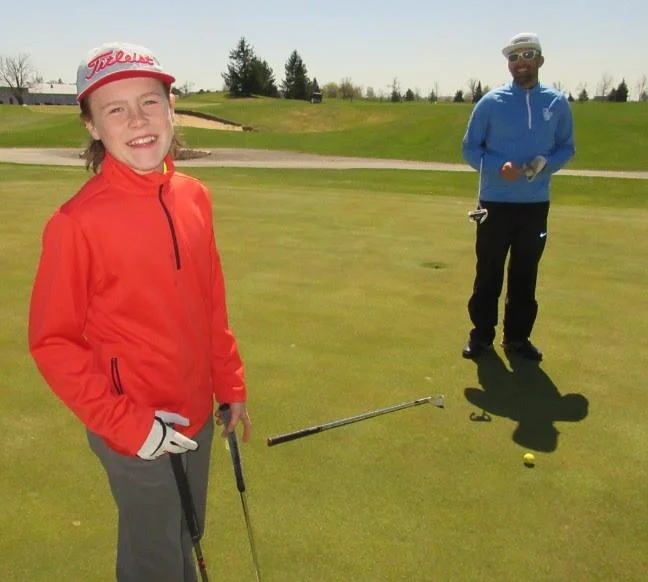 Tyler takes advanced golf lessons with Bradlee Ryall,- photo by Rob Campbell