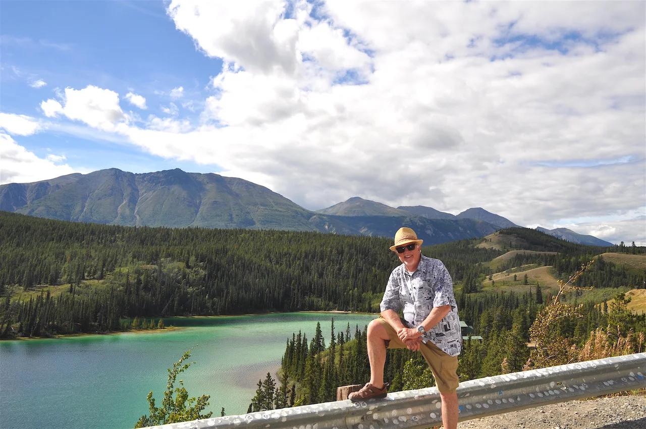 The author enjoys the view of Emerald Lake on the way to Skagway, Alaska.