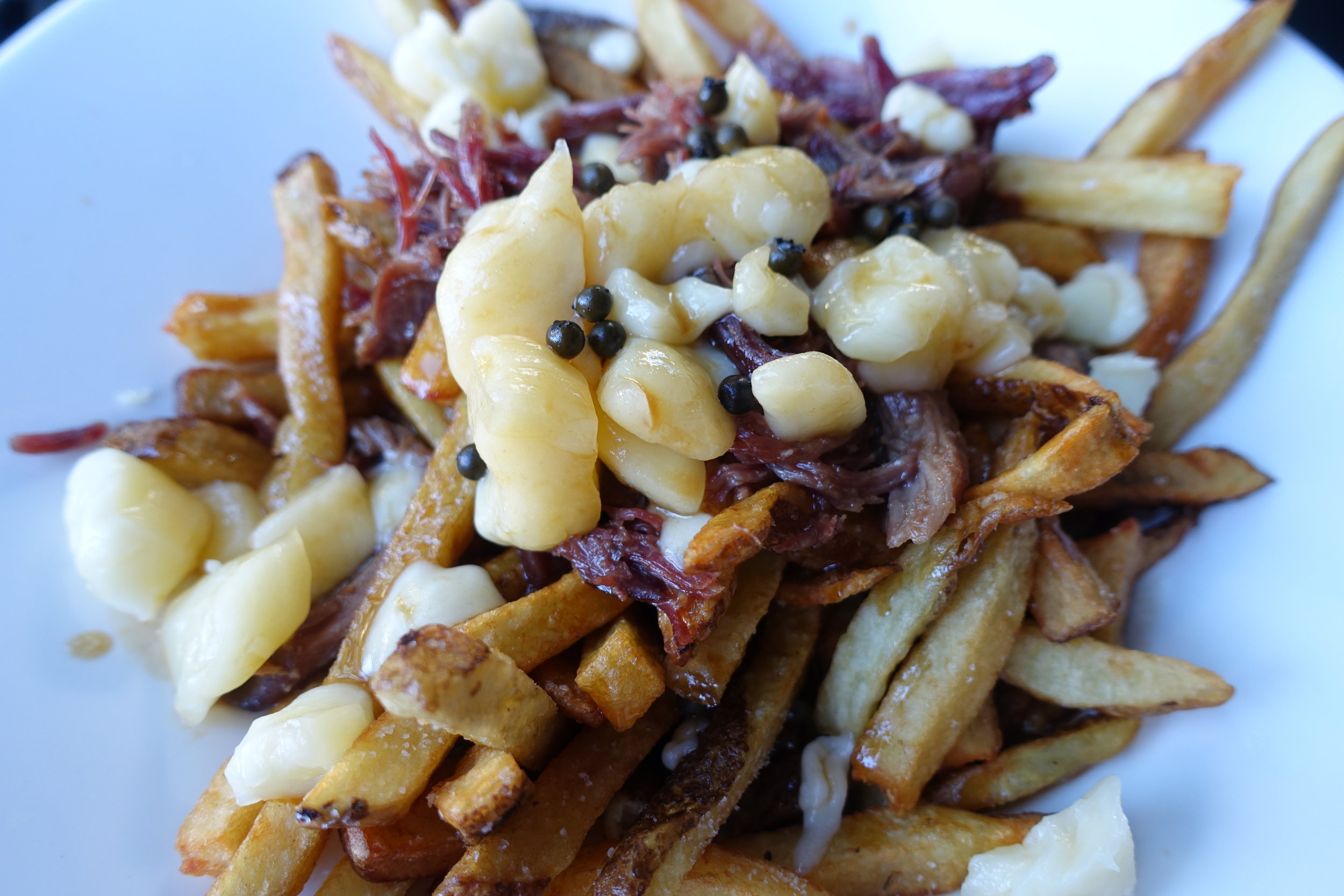  Smoked duck poutine with peppercorn sauce 