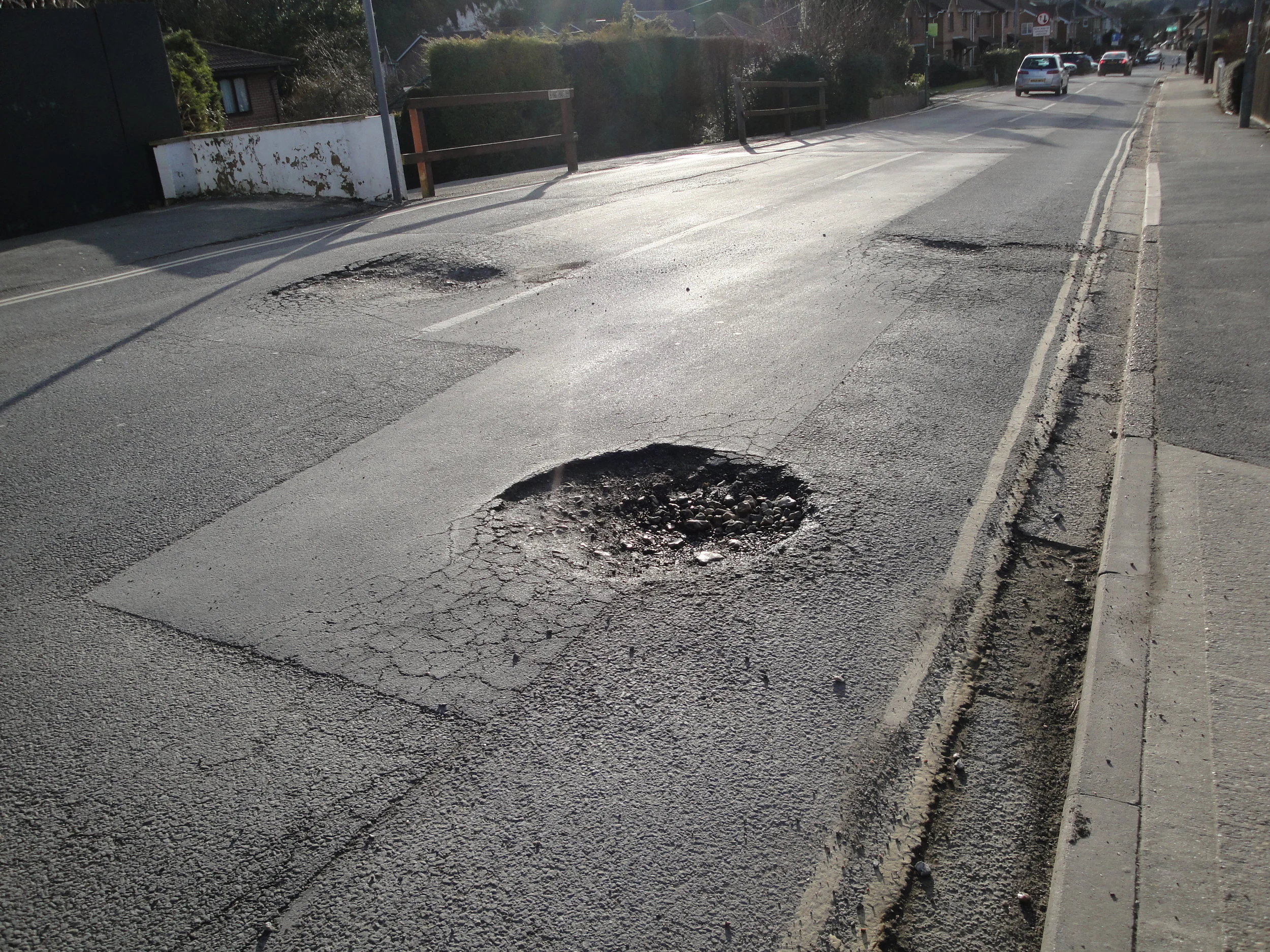 What you need to know about potholes and how they affect your car