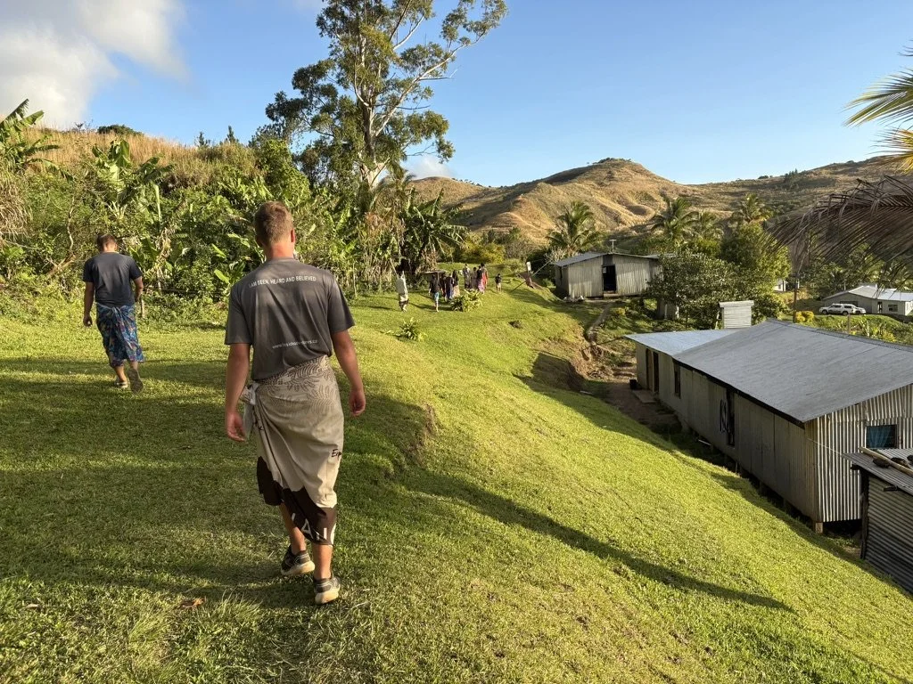 Fireside Adventures participants learning alongside a local Fijian community
