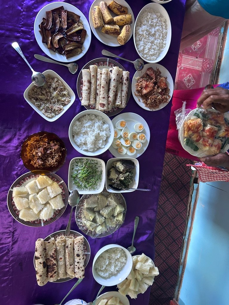 Teenagers preparing traditional Fijian food during a cultural immersion experience
