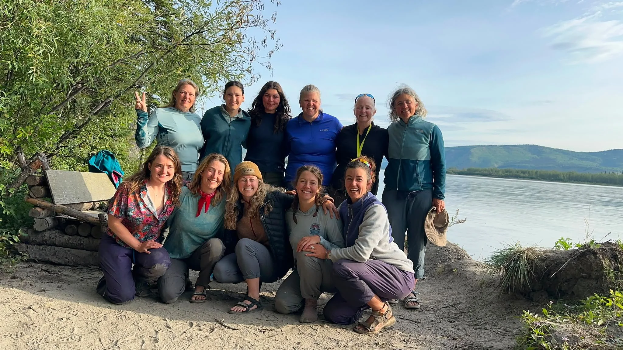 Group of women posing by Yukon River