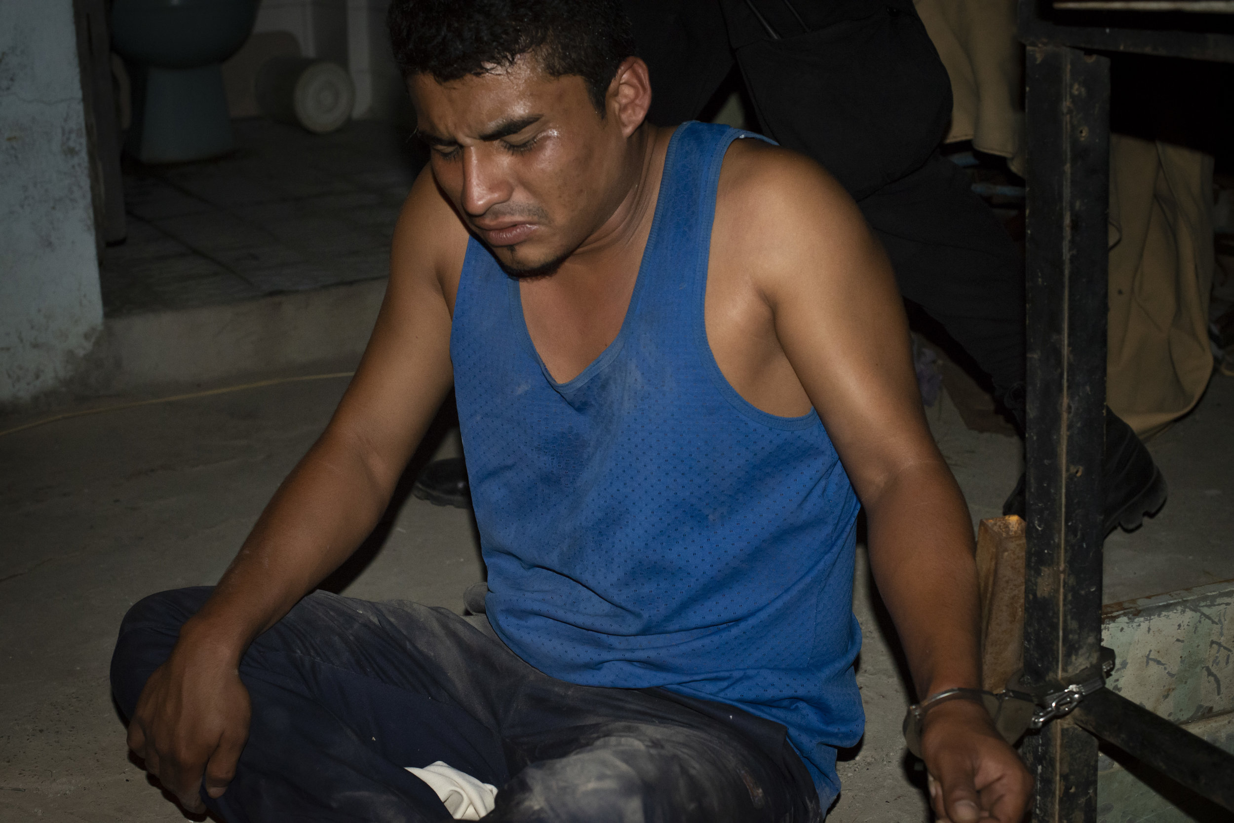  A suspected gang member being detained in San Salvador, El Salvador. 