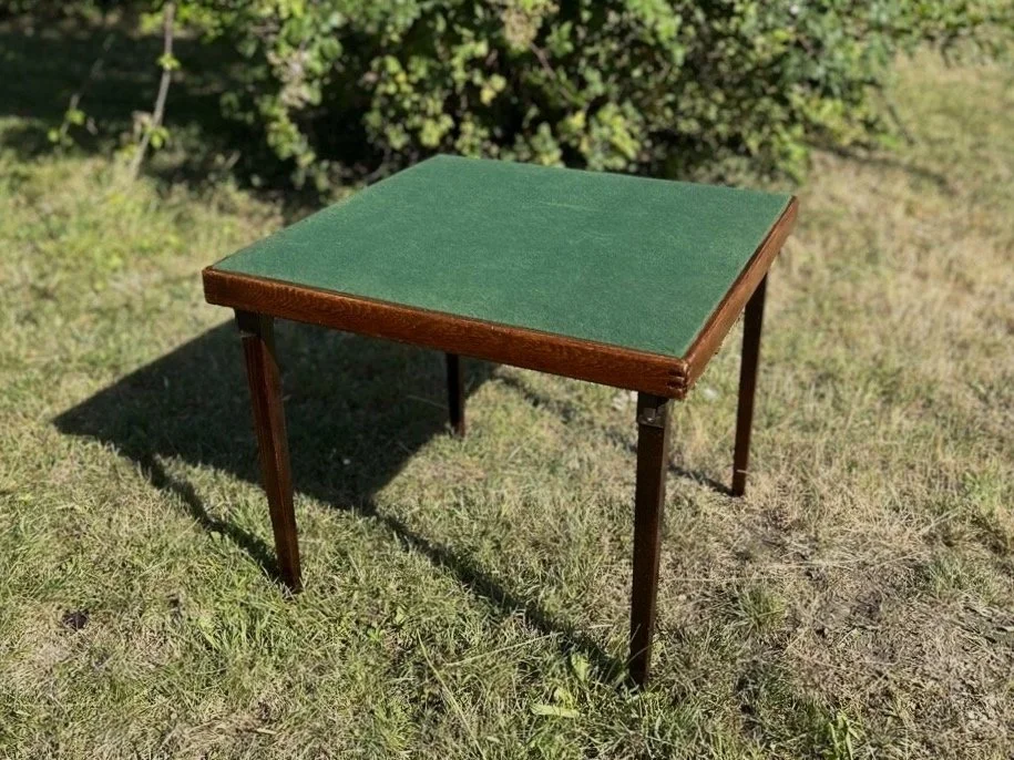 Small dark wood card table with green felt inlay to hire.