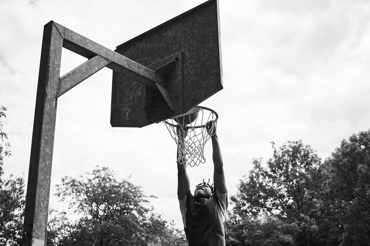 Game Time_BW_040_A player dunks the basket.jpg