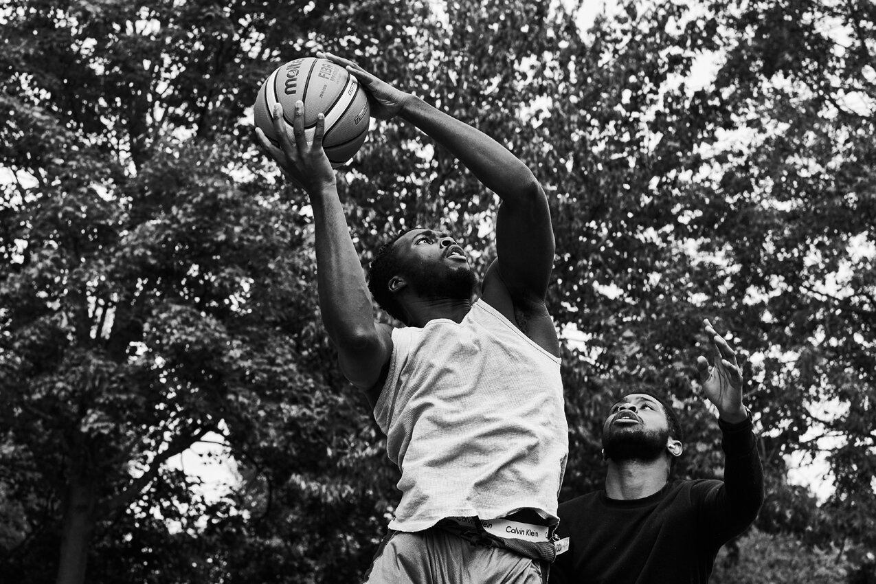 Game Time_BW_004_A young player called Tegs jumps to the basket.jpg