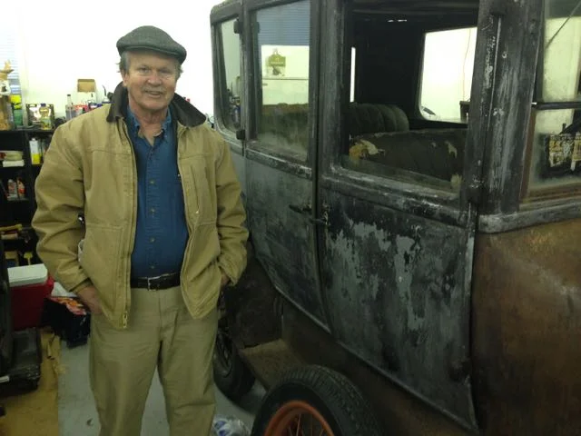  Dave Cooley beside his aluminum bodied Model T Fordor.