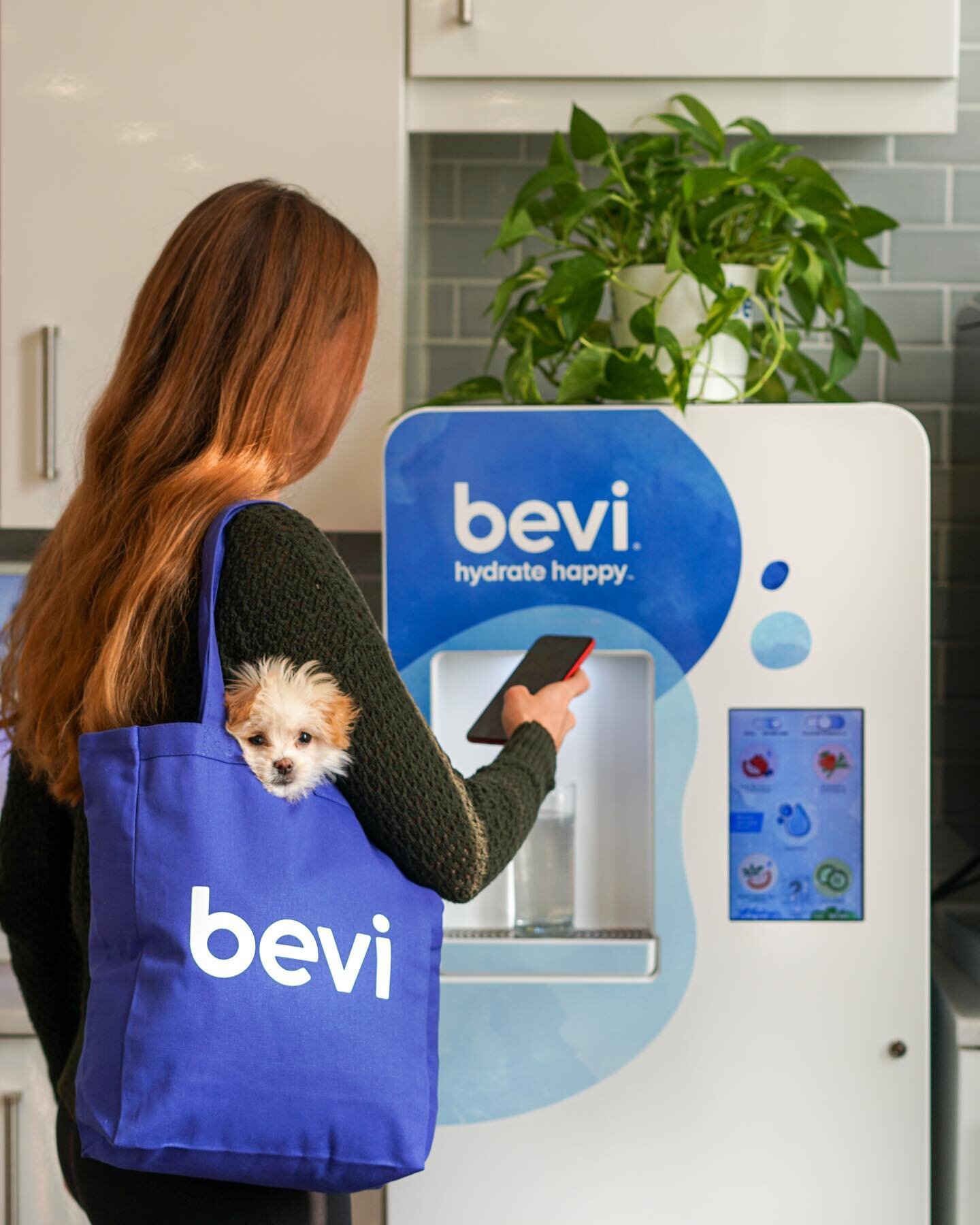 Touchless dispensing a sparkling water with one of my fav coworkers, @heyy.baebae 
🐶 💧 
#bevi