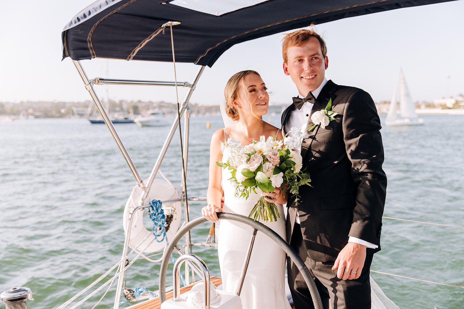 Newport Beach wedding  Christ Church ceremony  Newport Harbor Yacht Club reception  Private boat tour Newport Beach  Candid wedding photography  Timeless wedding photos  Authentic wedding storytelling