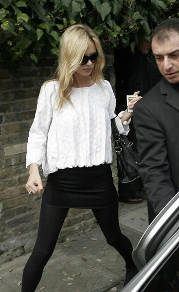 Black tights with floaty white top