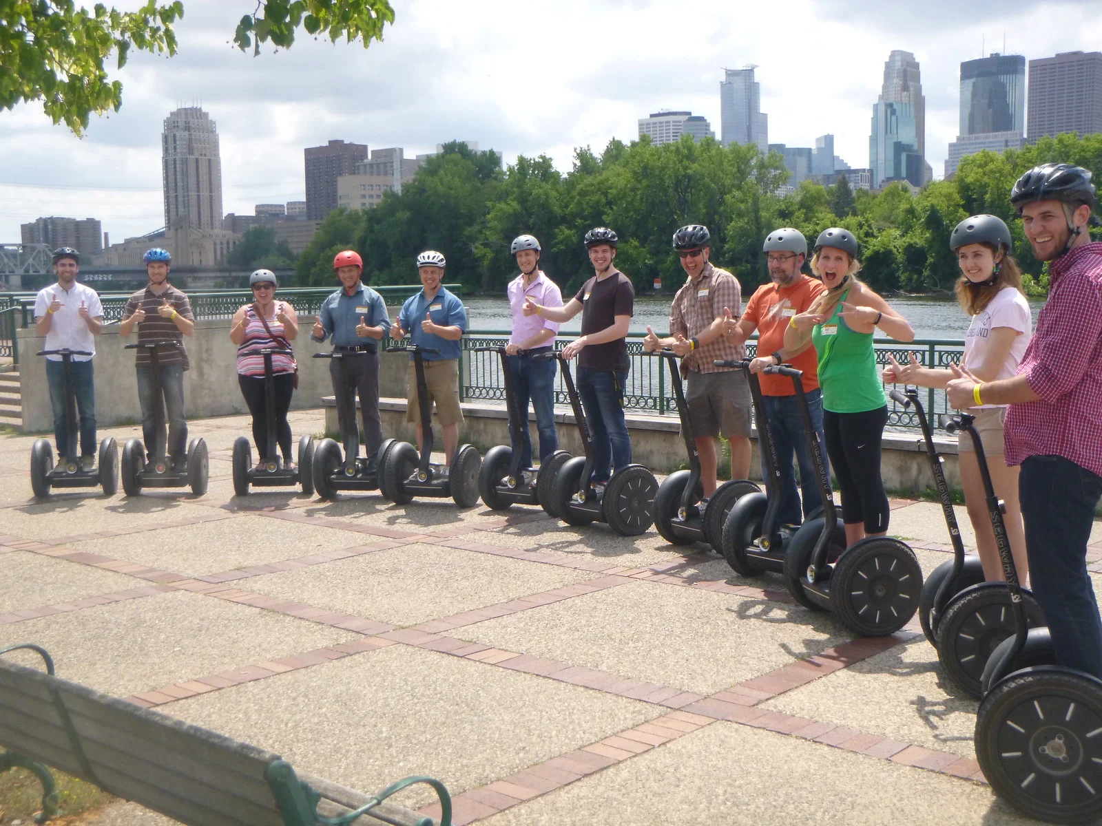 The Assessment Systems team enjoying a Segway tour of their neighborhood along the Mississippi River.