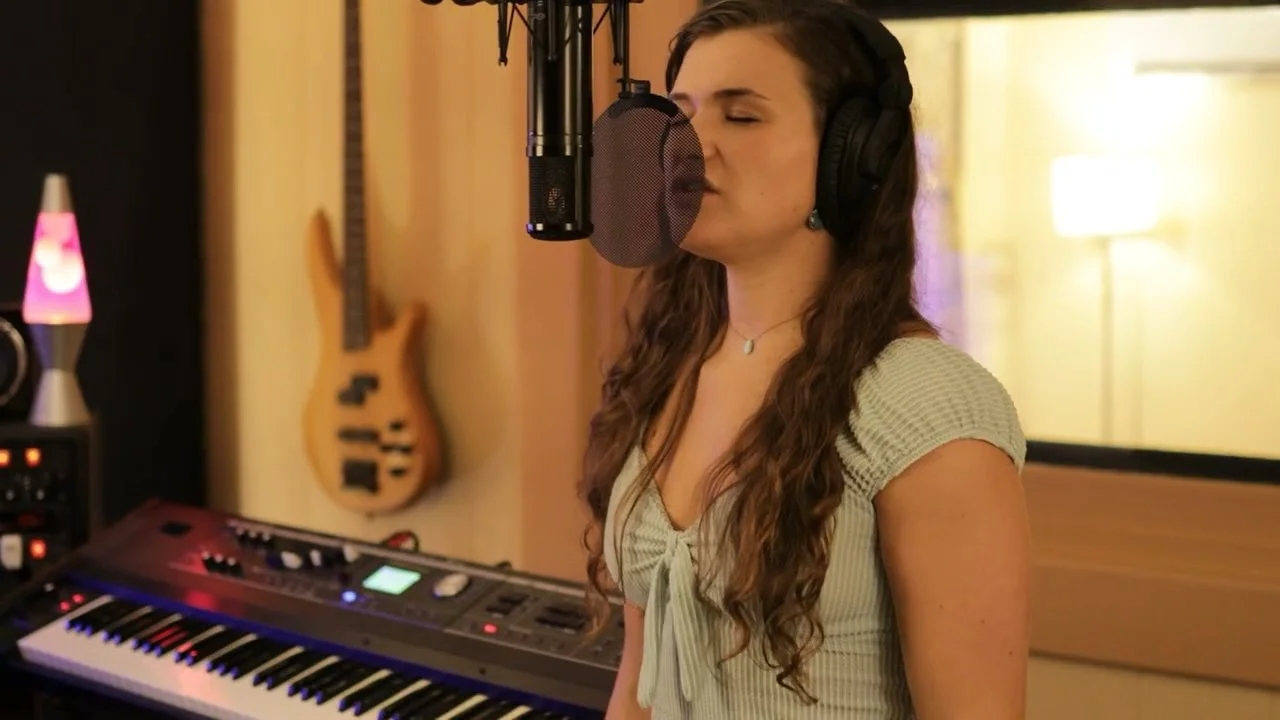 JBS-Elise at mic Come Together.jpeg
