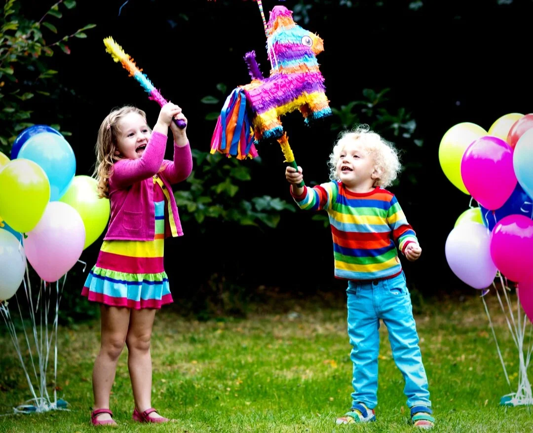The Pinata and children playing