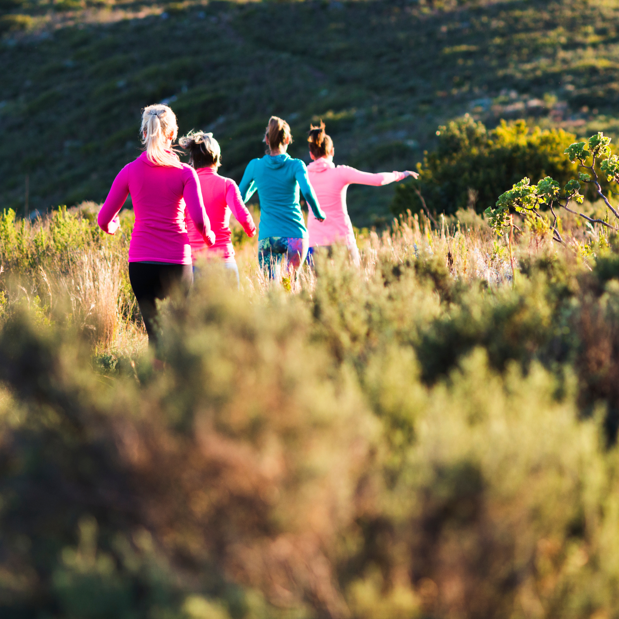 Ladies running through the hills