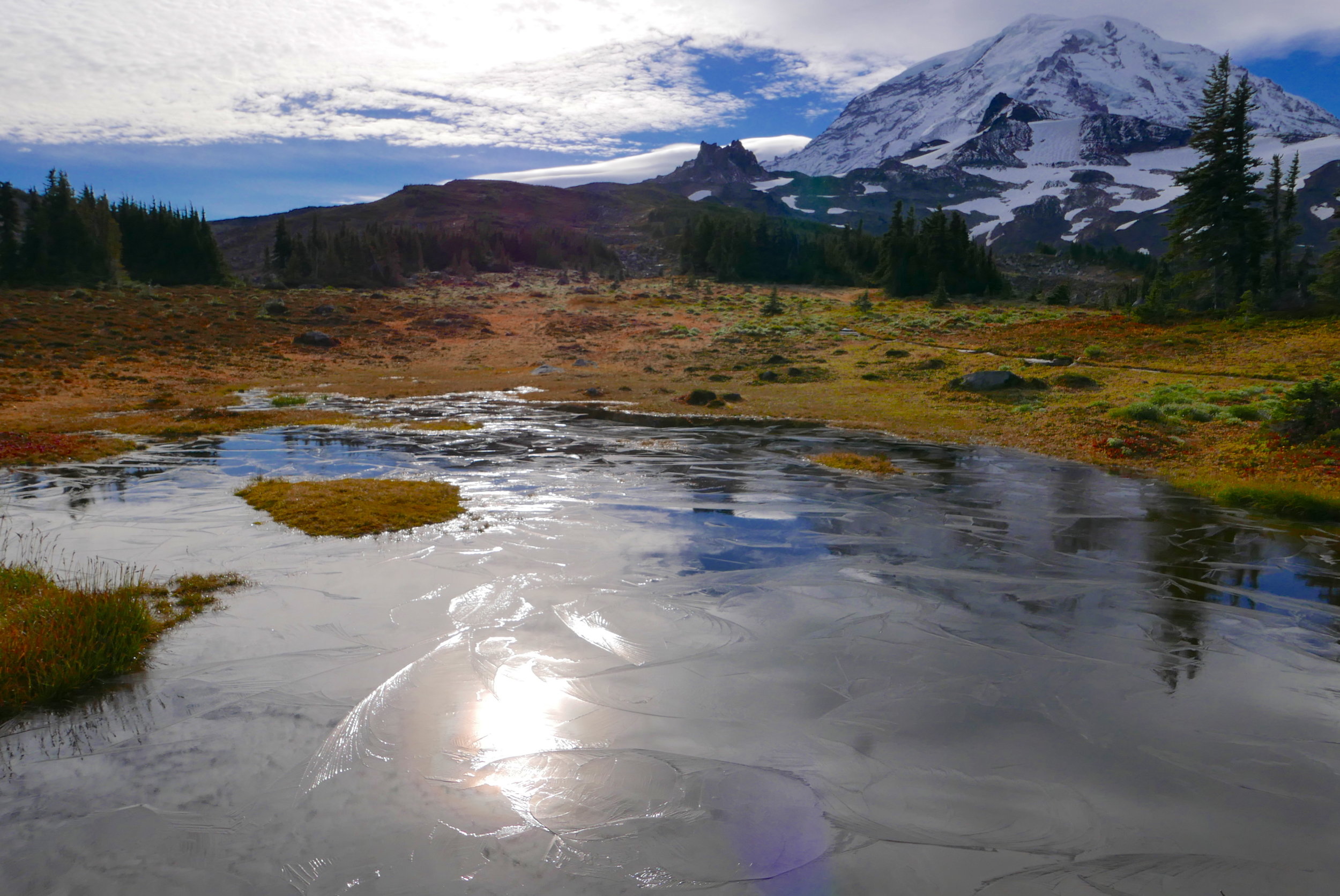 frozen tarn in Spray Park, looking at Echo and Observation Rocks