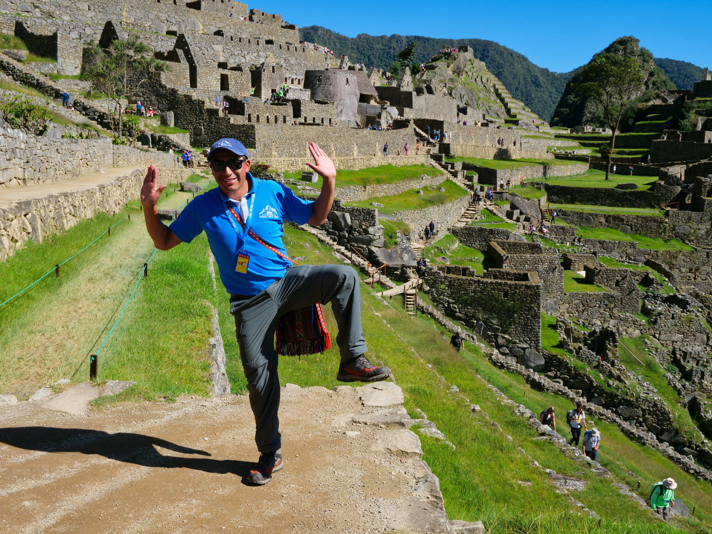 Guide Nico adds his own style to the Willis Wall Pose