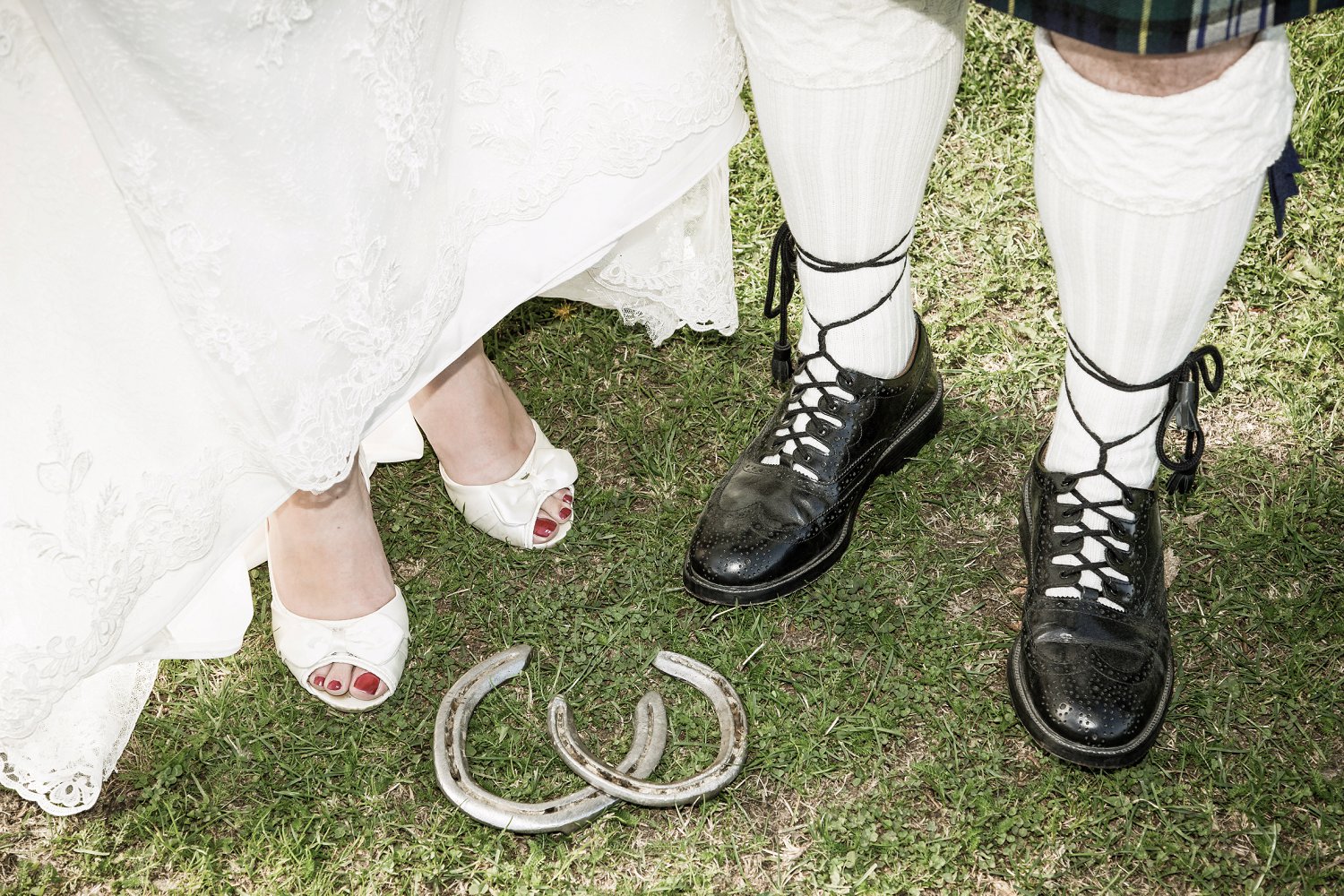 Detail portrait of wedding shoes and horse shoes by Wanaka wedding photographer Fluidphoto