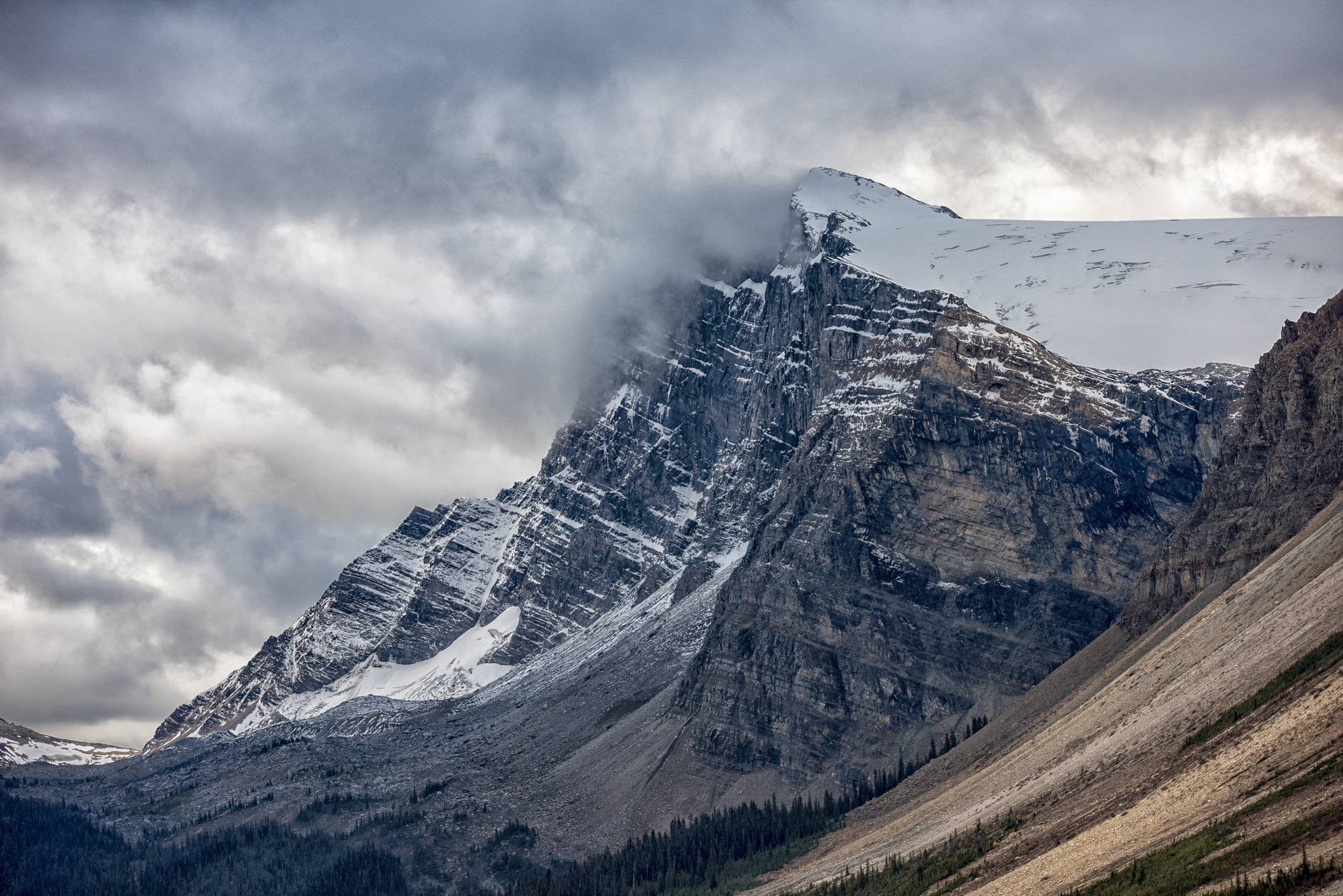 Dramatic Clouds hit the Rockies, Alberta