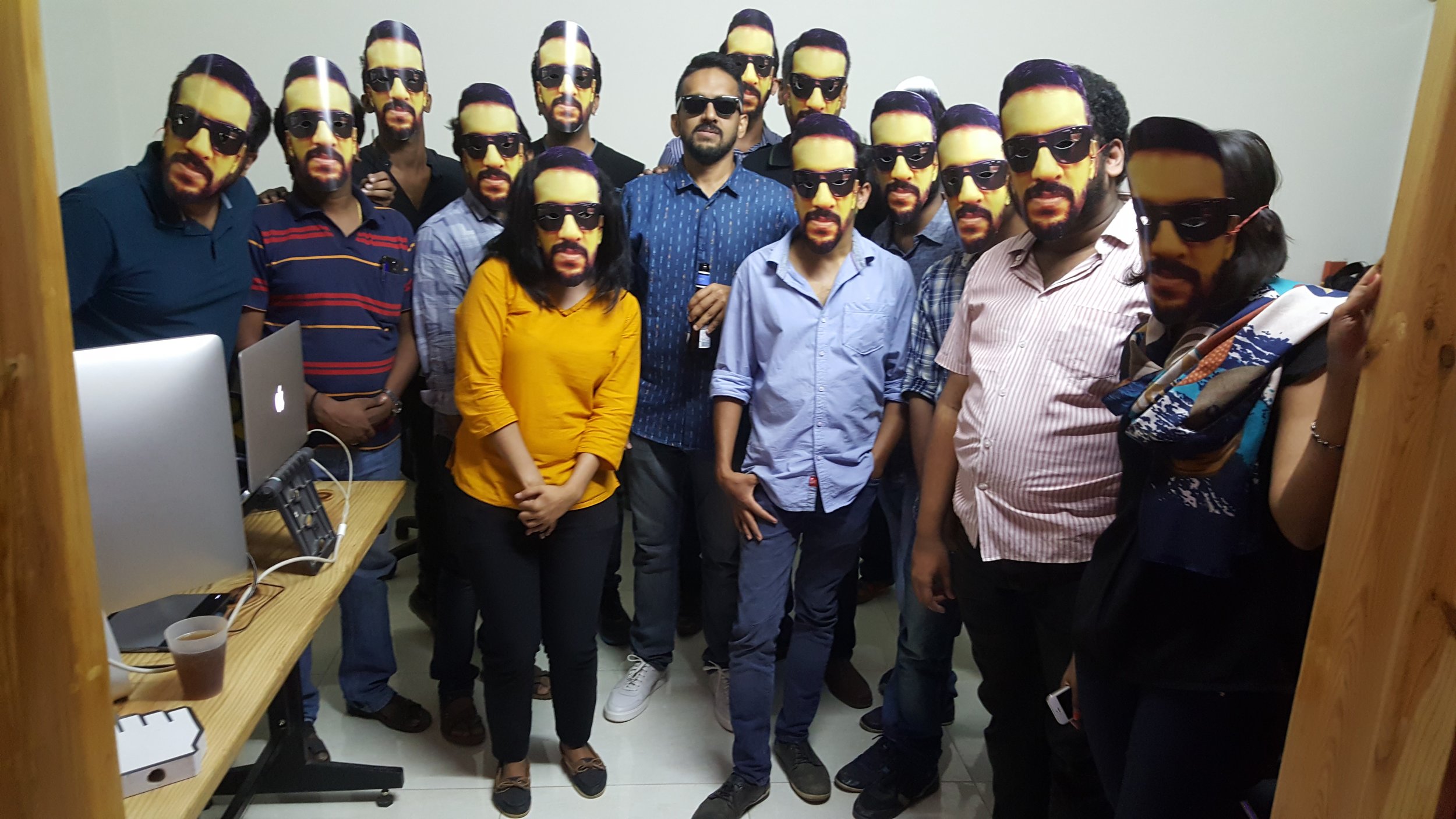 Unlike other cool office gang pics, this one has a part-time Bollywood actor in it.