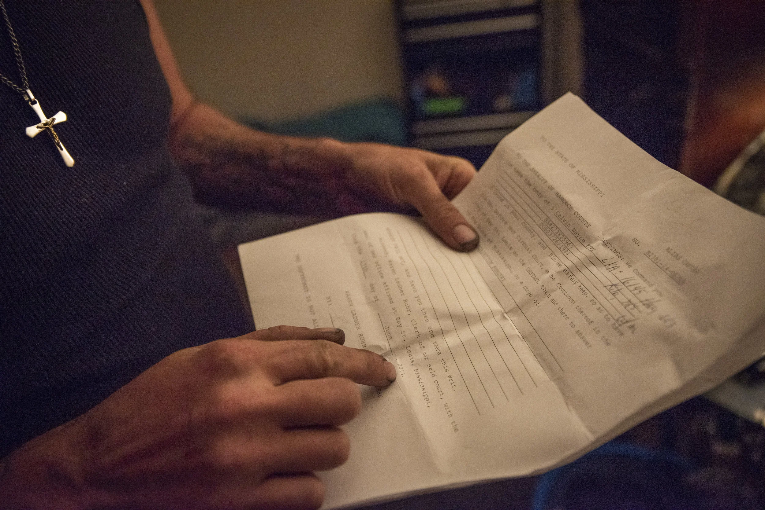 Calvin’s warrant for his arrest from 2014.