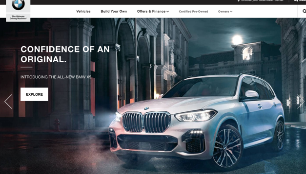 The BMW website shows a town car in a gothic style street, catering to the high-class, refined stereotype of Europe.
