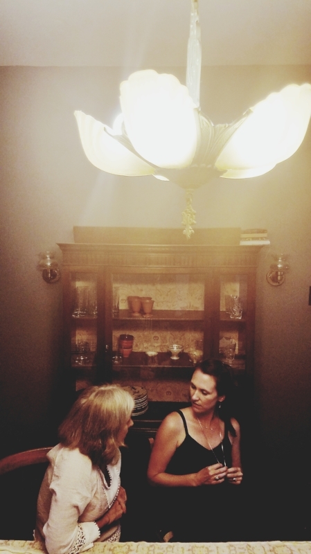 Virginia in deep conversation with an old friend in St. Louis.