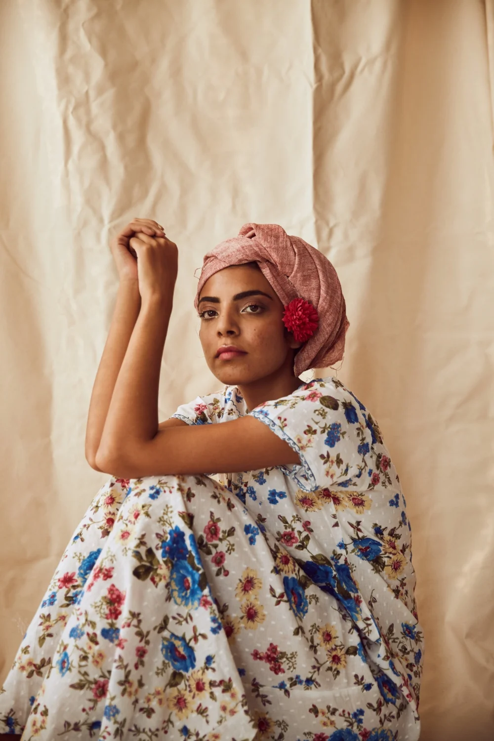 'A Botanical Delight', giddy blue flowers and muted yellow daisies dance all over this soft cotton nightie. A cotton head towel is worn to keep the model's hair dry.