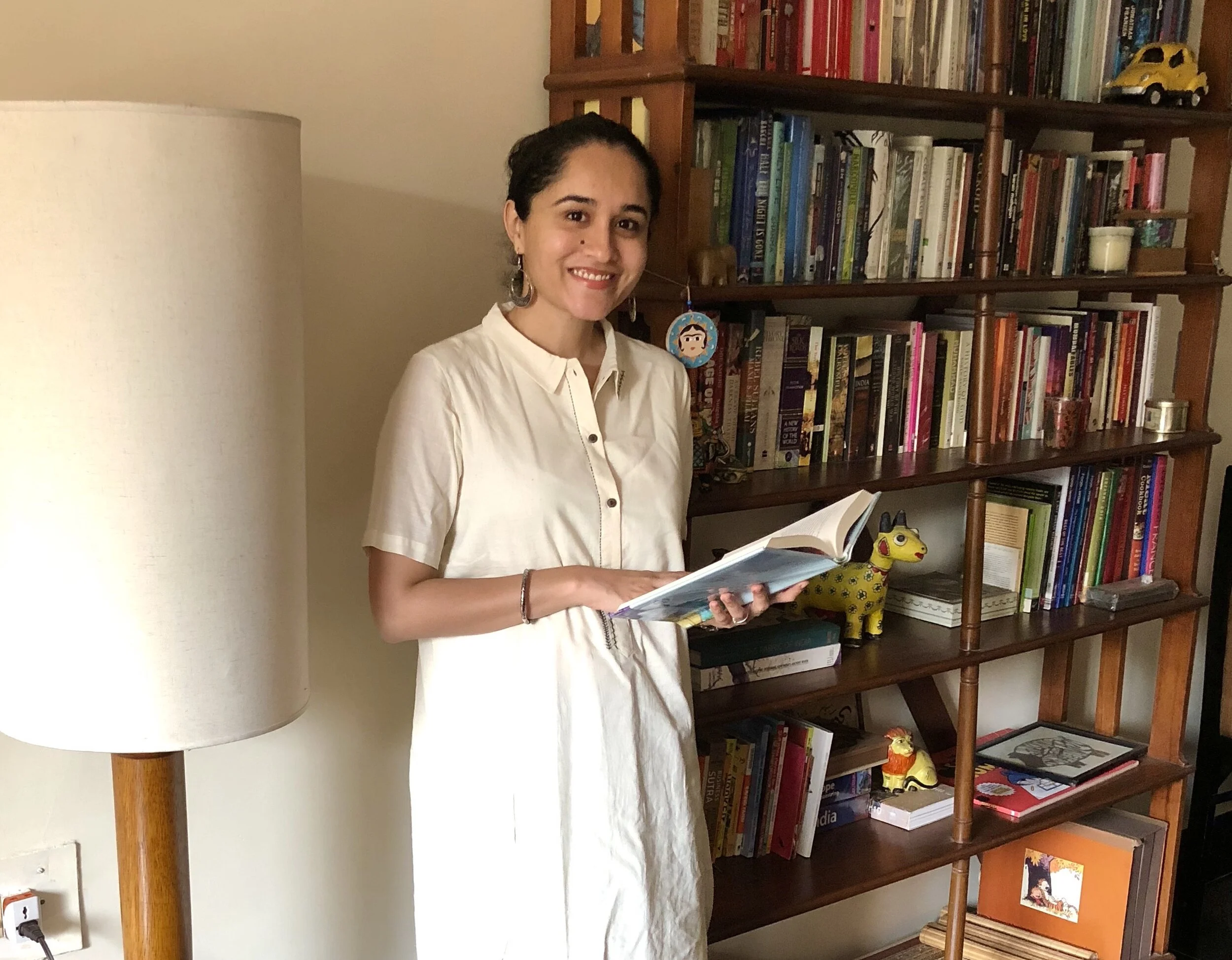 The author with her personal book collection.