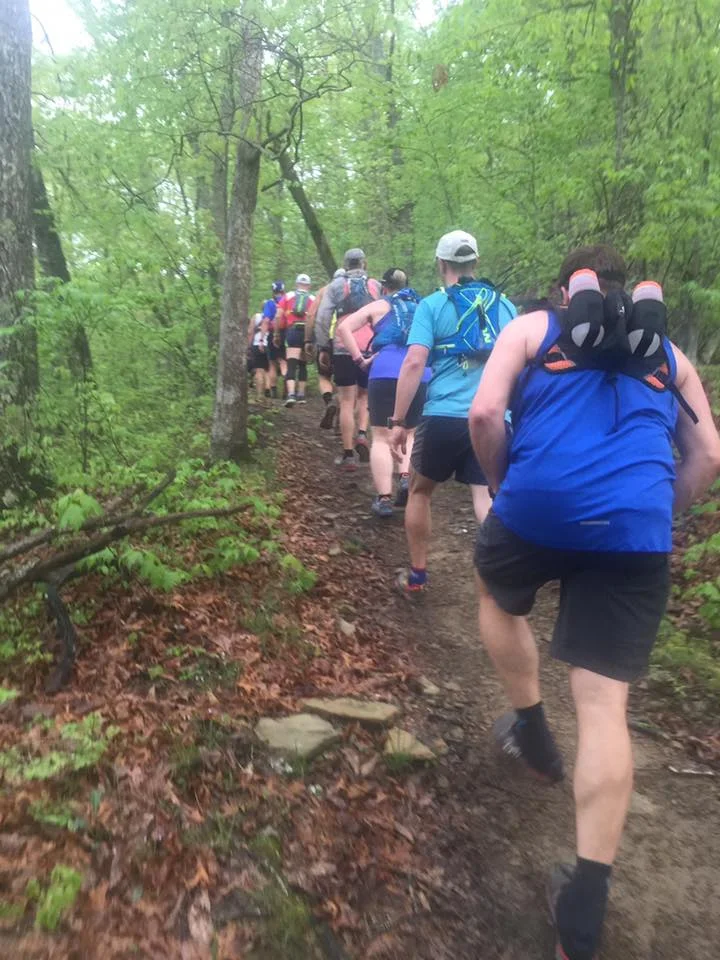 Runners marching up the hill early in the race. Photo by Amy McDowell.