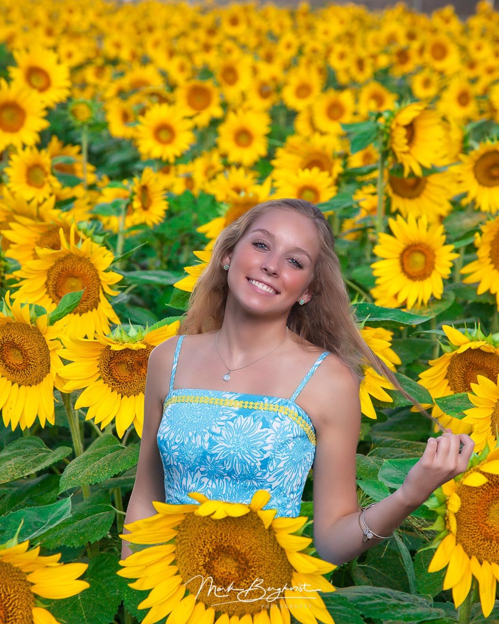 Bruecks,_Cameron_in_sunflower_field-1.jpg