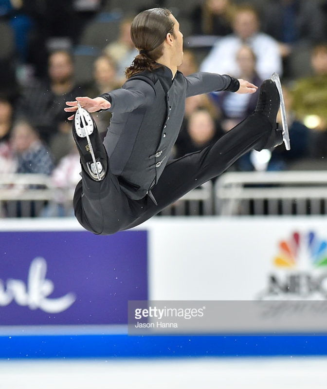 Can veteran Jason Brown, seen in a split jump, combine with phenom Nathan Chen to help the U.S. get three men's places in the 2018 Olympics?