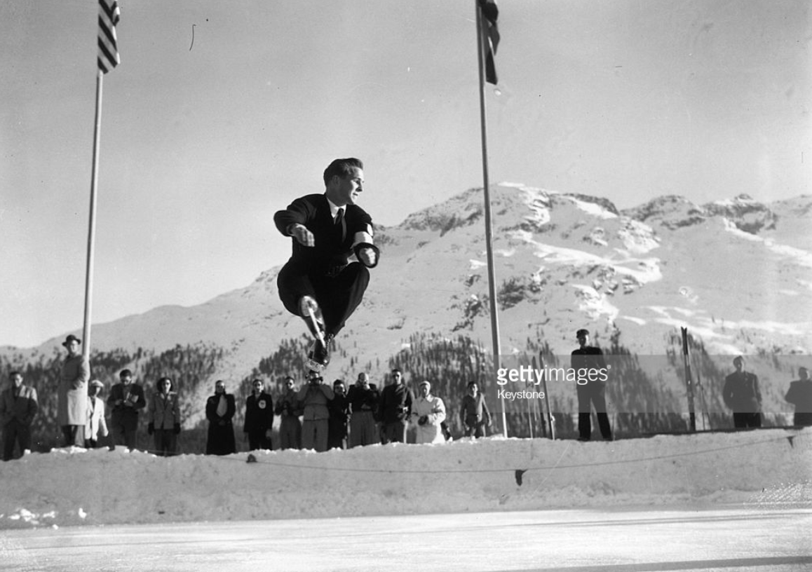 Dick Button soars above the ice in his gold-medal skate at the 1948 Winter Olympics in St. Moritz, Switzerland. He won again in 1952. (Getty Images)