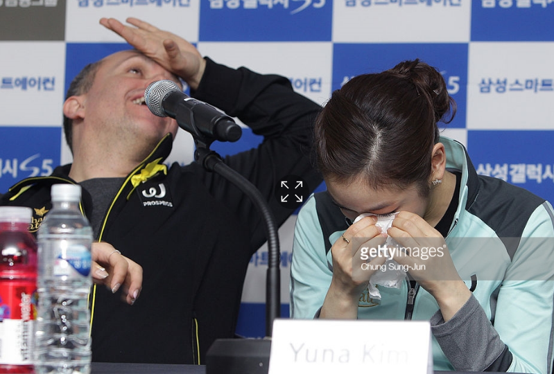 David Wilson and a tearful Yuna Kim at the South Korean skater's 2014 retirement press conference.