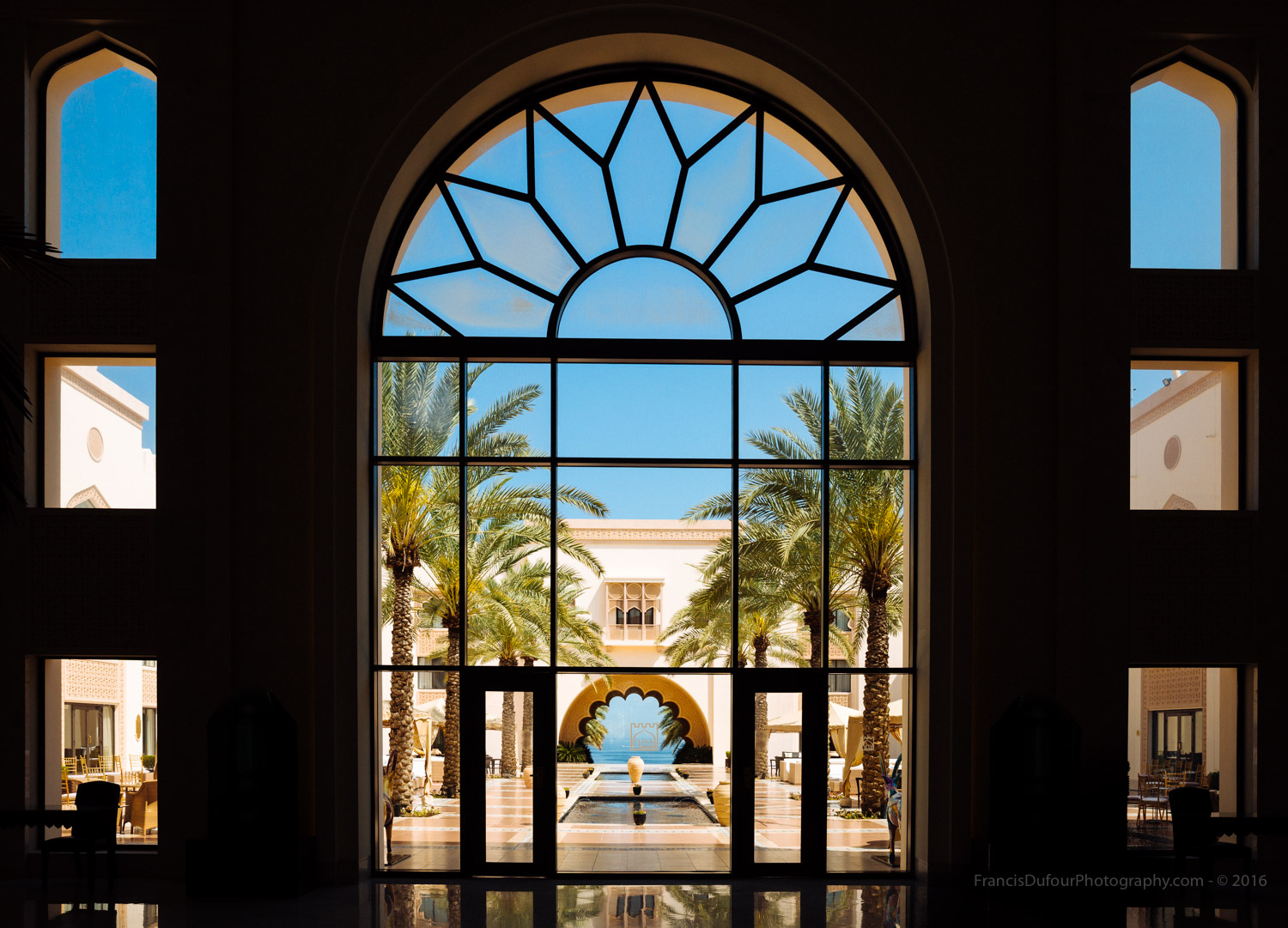 Al Husn Hotel's lobby and indoor court.