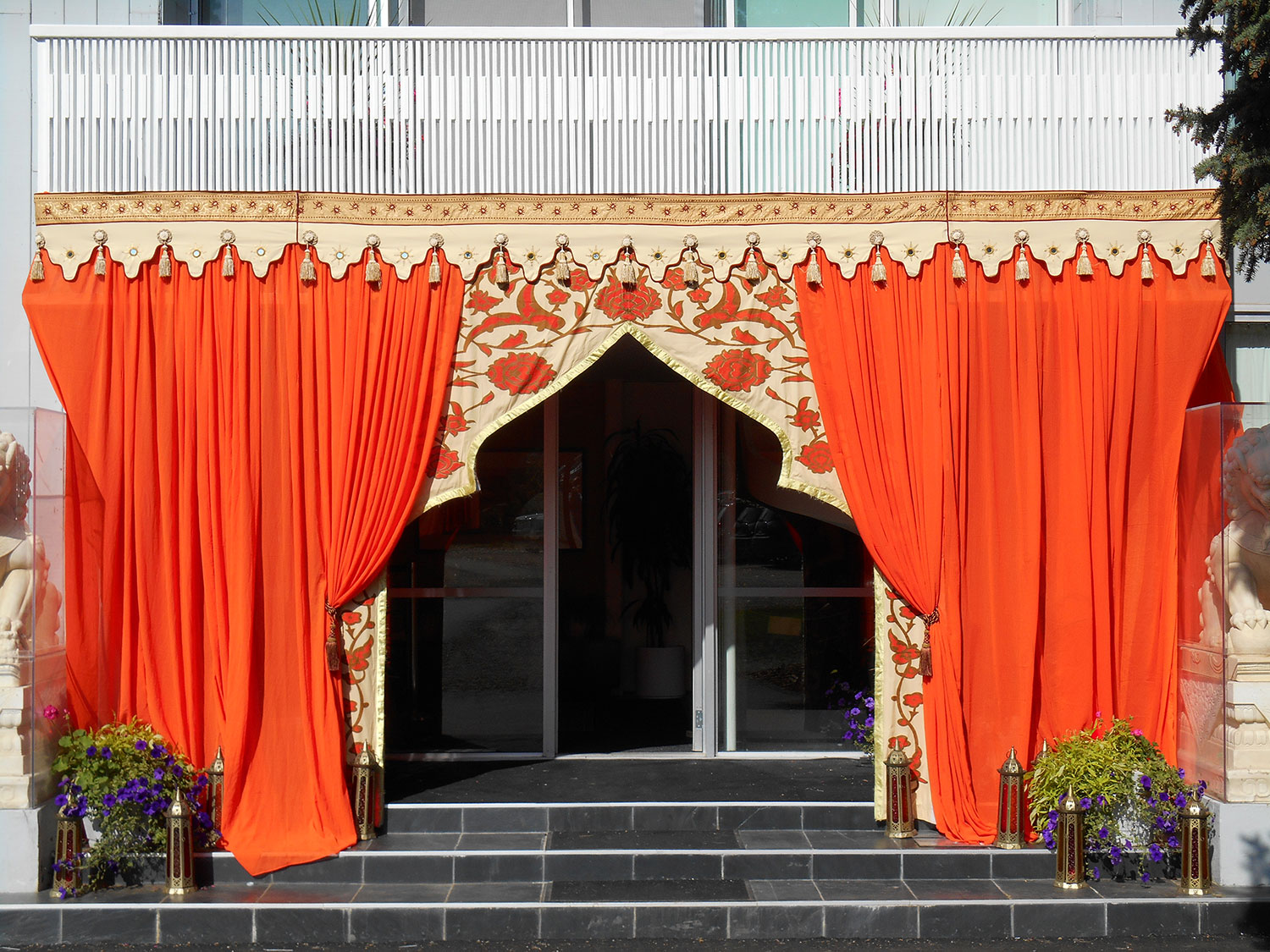 raj-tents-decor-treatment-orange-entrance-arch.jpg